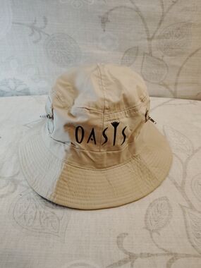 J Hats Oasis Beige Bucket Hat with Black Logo and Zipper Accents